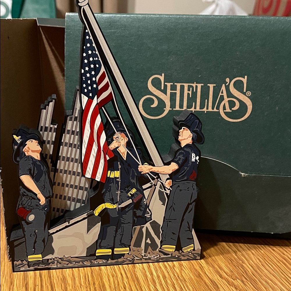 Shelia’s miniature decor Ground Zero United Firefighter with American Flag